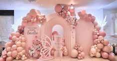 an elaborately decorated room with balloons and decorations