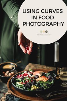 a person reaching for food on a plate with the words using curves in food photography