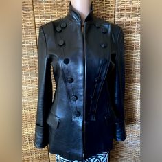 Ysl Leather Military/ Pirate Style Jacket By Tom Ford Soft Luxury Leather. Fabulous! , Only Worn A Couple Times. Shows No Wear At All. Ysl Monogram On The Silk Lining. Rare, Hard To Find. From 2001 Tom Ford Collection From Smoke Free/Pet Free Environment. Made In Italy Size 38 Measurements: Bust 36” Waist 31” Sleeves 18” From Armpit Designer Fitted Leather Jacket With Long Sleeves, Designer Double-breasted Leather Jacket For Formal Occasions, Fitted Luxury Leather Jacket For Evening, Designer Tailored Leather Jacket For Winter, Fitted Double-breasted Leather Jacket With Buttons, Designer Fitted Leather Jacket For Office, Designer Fitted Leather Jacket For Evening, Luxury Fitted Double-breasted Leather Jacket, Fitted Outerwear With Stand Collar For Evening