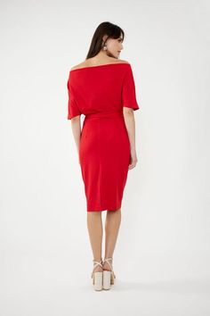 Highlight your chic and feminine aesthetic in this smart casual Joseph Ribkoff dress. This unique piece features a flattering boat neck, dolman short sleeves, and a knotted mini bodycon skirt. Expertly crafted with a focus on structure and form, it comes in an elegant plain design to complement your refined style. 95% Polyester, 5% Spandex Chic Short Sleeve Cocktail Dress, Casual Short Sleeve Bodycon Dress For Evening, Off-shoulder Midi Dress For Work, Chic Fitted Midi Dress With Boat Neck, Elegant Short Sleeve Mini Dress With Tie Waist, Chic Boat Neck Midi Dress For Cocktail, Chic Boat Neck Cocktail Midi Dress, Chic Bodycon Short Sleeve Midi Dress, Chic Bodycon Short Sleeve Dress