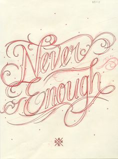 the words never enough are drawn in red ink on white paper with snowflakes