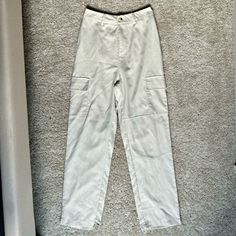 Never Worn. Pockets On The Side White Pants With Pockets For Spring, Fitted White Cargo Pants, High Waist White Cargo Pants For Summer, Fitted White Cargo Pants For Work, White Straight Leg Bottoms With Pockets, White Summer Cargo Pants With Pockets, White High Rise Cargo Pants With Pockets, High Rise White Cargo Pants For Spring, White Cargo Pants For Summer