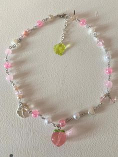 If you like peaches and you like pink, this necklace is perfect for you!  This is an resizable necklace, with a super cute pink peach charm on it. Pink Jellyfish, Peach Necklace, Bracelet Inspo, Red Tulips, Charm Necklaces, Pink Peach, Crafty Diy, Pink Bow, Peaches