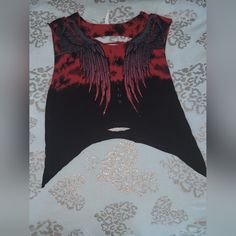 **Limited Edition** **Never Worn** Red And Black Mix Dyed Tank Top That Is Ripped In The Front And Back , With Rhinestone Angel Wings In The Front With The Affliction Logo In Between And Gray Wings In The Back Red Gothic Sleeveless Top, Red Sleeveless Gothic Top, Black Distressed Festival Top, Distressed Red Tops For Streetwear, Distressed Black Top For Festivals, Red Distressed Top For Streetwear, Black Distressed Top For Festival, Alternative Fitted Red Tops, Punk Style Red Tops For Alternative Fashion