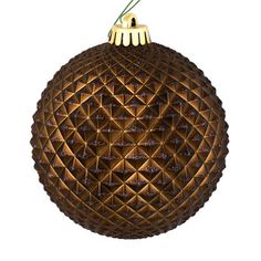 a brown ornament hanging from a string