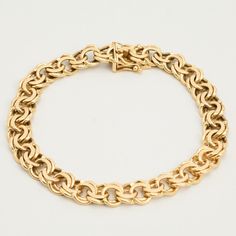 B I S M A R C K ∙ B R A C E L E T  ∙  * Details: Solid Gold ∙ 14K Gold ∙ Yellow Gold * Weight: 25.07 grams * Bracelet length: 7.68 inches // 19.5 cm * Width: 8 mm. * Condition: All our pieces are vintage, antique or close to new. The piece undergoes a restoration proces, which includes ultrasonic cleaning and mild polish techniques to enhance the condition of the piece. * All our pieces are vintage and handpicked. We put a lot of effort into finding the most unique and beautiful items for you gu Hallmarked Round Gold Bracelet, Formal Yellow Gold Chain Bracelet With Spring Ring Clasp, Oval 14k Yellow Gold Bracelet, Hallmarked 14k Gold Bracelet, 14k Gold Round Chain Bracelet, Heirloom 14k Gold Round Bracelets, Heirloom 14k Gold Bracelets, Heirloom 14k Gold Round Bracelet, Formal 14k Gold Chain Bracelet With Spring Ring Clasp