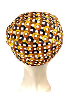 Funny cap in printed fabric with geometric motifs inspired by funk disco era from the 70s, in light and breathable fabric. The upper of the visor cap is made of chocolate brown natural leather. This detail contrast the front profile of the cap with the printed fabric in brown tones: beige, honey, orange, hazelnut and chocolate brown. Cut and sewn on the bias, this cap adapts very well to the head due to its original pattern. The interior is made of a very light cotton lining For its production w Retro Brown Hats, One Size Fits Most, Retro Brown Hat, One Size Fits Most, Retro Brown Hats One Size Fits Most, Retro Brown Adjustable Hat, Retro Brown Hat, Cap For Man, Front Profile, Disco Funk, Disco Era