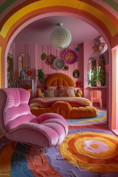 a bedroom with pink walls and colorful rugs