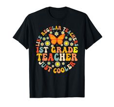 a black t - shirt that says it's regular to be 1st grade teacher