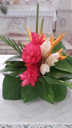 a bouquet of flowers sitting on top of a table