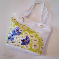 ♥Violets and Daisies Bag, Hadpainted Summer Bag, Floarl Bag, Violets Handbag, Daisies Summer Bag, Handpainted Flowers Bag, Hand Painted Bag♥ HAND PAINTED HANDBAG by DiqnaDesign. ------- SIZE & DETAILS ------- Unique handpainted product Professionally hand-painted with lots of love. Measures: 30 x 39 cm ≈ 11.8 x 15.3 inches, This bag is fastened with a zipper. There are no internal divisions. Material: Eco Leather All bags are hand painted with professional textile paint Because these are Ori Artistic Hand Painted Shoulder Bag For Gift, Artistic Hand Painted Shoulder Bag Gift, Artistic White Bags For Daily Use, Artistic White Bag For Daily Use, Hand Painted Tote Shoulder Bag For Daily Use, Artistic White Bag For Shopping, Artistic White Shopping Bag, Artistic Tote Bags For Spring, Hand Painted Tote Shoulder Bag For Gift