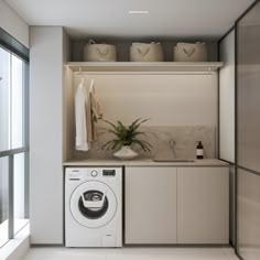 a washer and dryer in a small room