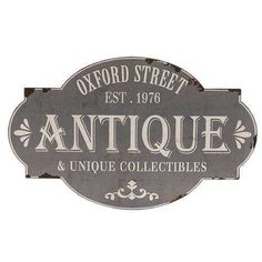 an antique and unique collectibles sign