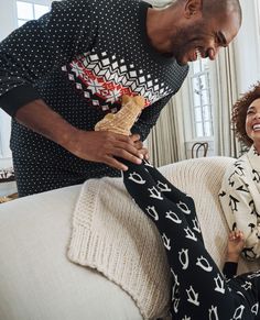 Adult unisex Long John pajama top in legendary soft organic cotton rib knit, complete with cheerful holiday print fit for every festive moment. • Hypoallergenic & eczema-friendly • Sensory-friendly scratch-free seams that lay flat on the skin • Like new wash after wash • OEKO-TEX® STANDARD 100 certified safe from hundreds of harsh chemicals 100% organic combed cotton rib knit Super-smooth flatlock seams Soft ribbed neck and cuffs Tops and pants offered separately for the very best fit OEKO-TEX® STANDARD 100 | 03.U.9375 HOHENSTEIN HTTI | Tested for Harmful Substances | www.oeko-tex.com/standard106 GOTS Certified by OTCO Prewashed Imported. Pajamas, Shop By Department, Men & Adult Unisex. | Adult Holiday Long John Pajama Top - Size XS - Black Fairisle - Hanna Andersson Winter Crew Neck Sleepwear With Relaxed Fit, Winter Crew Neck Relaxed Fit Sleepwear, Casual Winter Sleepwear For Holidays, Casual Cotton Holiday Sleepwear, Casual Winter Holiday Sleepwear, Festive Winter Cotton Sleepwear, Playful Cotton Sleepwear For Winter, Blue Cotton Christmas Sleepwear, Hannah Anderson Pajamas