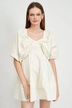 Crafted with luxurious 100% cotton poplin, this off white mini dress by EN SAISON is sure to make a statement. Fully lined with hidden underwire at the bust and pleated trim at the hem, the classic sweetheart neckline is framed by the elegant butterfly-style wide sleeves. A hidden zipper at the back completes the look. **Sizing notes: Model is 5'9 and wears size small XS (0-2) S (2-4) M (6-8) L (10) MATERIALS: 100% Cotton // Lining: 100% Cotton CARE: Hand wash Outfit Minimal, Butterfly Style, Grad Dresses, Virtual Closet, Wide Sleeves, A Frame, Dress 100, White Mini Dress, Diy Inspiration