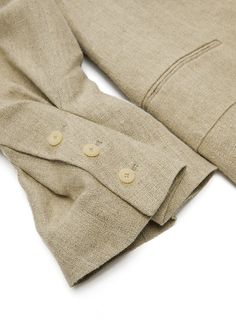 100% linen Inner: 100% cupro fiber Notched lapels Front button fastening Buttoned cuffs Linen Blazer With Button Closure And Lapel Collar, Classic Linen Blazer With Button Closure, Classic Linen Outerwear With Button Cuffs, Linen Blazer With Buttons For Tailoring, Business Linen Button-up Blazer, Linen Blazer With Lapel Collar And Buttons, Linen Button-up Blazer For Business, Formal Linen Button-up Outerwear, Formal Linen Button-up Blazer