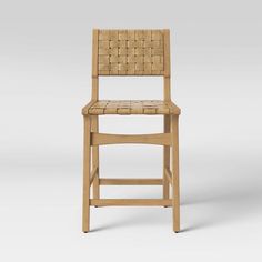 a wooden chair with woven seat and back