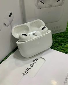 an apple airpods sitting on top of a box