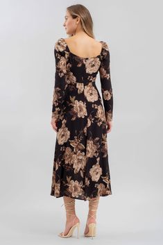 Brown and black floral midi dress -Long sleeves, square neckline, mid length-Zip back closure -Elastic at the shoulder-Unlined Fit: True to size. Gathered at the waist with little give.Sav is 5’3” with a 25” waist and is wearing size small. This long sleeve midi dress is perfect for any occasion, from wedding guest attire to a casual day out. The square neck and thigh split add a touch of elegance. The floral design gives a feminine touch to this versatile dress. Fabric: 100% rayon Black Floral Midi Dress, Wedding Guest Attire, Wallpaper Floral, Fall Wedding Guest, Black Floral Dress, Guest Attire, Wedding Attire Guest, Cropped Jumpsuit, Graphic Apparel