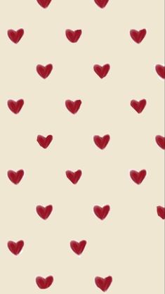 red hearts are arranged on a white background