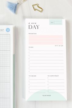 a planner, pen and paper on top of a desk with the words to each day written