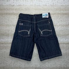 "Vintage Skater Wide Leg Jean Shorts 5ive Jungle Dark Wash Baggy Denim Rap Style Art Y2K Skate / Streetwear Great Condition: 9/10 Men's Size:  Waist: 36\" Length (inseam): 13\" Leg Opening: 12\" Thigh Opening: 13\" Front Rise: 12.5\"" Y2k Cotton Jean Shorts For Streetwear, Casual Dark Wash Jean Shorts For Streetwear, Y2k Short Jeans For Streetwear, Dark Wash Jean Shorts For Streetwear, Retro Shorts With Pockets For Streetwear, Casual Cotton Jean Shorts For Streetwear, Casual Jean Shorts For Streetwear, Retro Blue Jean Shorts For Streetwear, Y2k Style Medium Wash Shorts For Streetwear