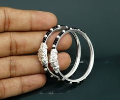 Vintage antique style handmade sterling silver gorgeous new born baby bangle bracelet kada pair for unsex kids. excellent crocodile face design customized tribal jewelry from India.Metal-925 sterling silver.Item type-Baby Bangle.Weight-11.880 grams approx.Size-3.8 cm or 1.5 inches inner diameterWidth-4 mm approx.perfect for new born baby. Makes excellent gifting and collectible jewelry. Silver Baby Bracelet, Baby Jewellery, Kids Bangles, Antique Necklaces Design, Diamond Mangalsutra, Handmade Hoop Earrings, Antique Necklaces, Diamond Pendent, Baby Bangles