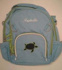 Super cute! Great for school, sports, or travel! This bag has already been personalized by PBK with the name "Isabelle" in white. Looks nice! Size: Small 11" wide x 4" deep x 14" high. Fits children who are 43-49" tall. Can hold a lunch bag, two small notebooks, two books, and a water bottle. Condition: Brand new Color: Light blue with green accents and cute turtle patch on the front. What you see in the photos is what you will get. No special orders. Get it here faster and for less money! Name Patch Backpack, Backpack Patches, Cute Turtle, Cute Turtles, Small Notebook, Green Accents, Color Light Blue, School Sports, North Face Backpack