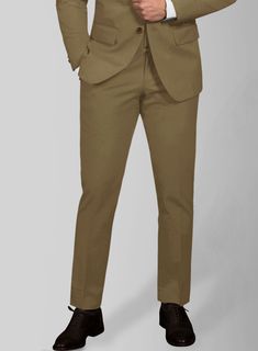 Exhibit sophistication in a unique way by pulling off our Earthy Brown Cotton Power Stretch Chino Suit. However, our suit is made from a luxe blend of cotton and lycra fabric that gives off a supple, sharp and evenly plush feel with a solid brown finish. Plus, seal a peaceful approval by combining strict tailoring, which bestows a clean and tapered silhouette with sartorial details while keeping plenty of room for movement and comfort. Then, pair this summer friendly option to attend destination Cotton Suits For Business Casual, Elegant Fitted Cotton Suits, Slim Fit Cotton Suits For Workwear, Slim Fit Cotton Suit For Work, Cotton Solid Color Suits For Workwear, Solid Cotton Suits For Work, Slim Fit Cotton Suits With Notch Lapel, Formal Slim Fit Cotton Suits, Solid Cotton Suits