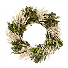 a wreath with white and green leaves