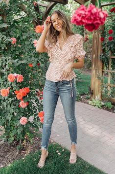 The Folksong Floral Top in Coral is a great way to bring a subtle floral print into your summer wardrobe. With tons of tiny flowers sprinkled all over this beautiful top and ruffled sleeves, you'll feel pretty and feminine every time you wear it. Pair this with trousers for a polished look, or your favorite slim fit jeans for a perfectly put together option.Lightweight + Elastic SleevesRuffle Details + Wrap Peplum Hem100% Polyester Wash Cold, Hang Dry Fits True To Size, If In Between Sizes Consi Folk Song, One Piece Outfit, Peplum Hem, Feel Pretty, Tiny Flowers, Ruffled Sleeves, Polished Look, Floral Top, Slim Fit Jeans