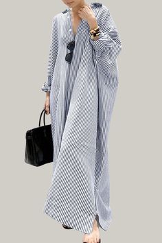 Effortlessly stylish and sophisticated, this striped oversized shirt dress is perfect for the warmer seasons. With a button front, a split neckline, and a high waistline, it exudes elegance and class. The long sleeves and drop shoulder design add a touch of artistry, while the straight hem and non-stretch fabric provide a luxurious finish. Perfect for the fashion-forward and discerning consumer. 95% Polyester, 5% Elastane Please allow 3-5 business days to process and ship. Product Measurements in cm : Size US Bust Length Sleeve Length Cuff S 4 90 130 72 31 M 6 94 131 73 32 L 8/10 100 132 74 33.5 XL 12 106 133 75 35 Bandage Jumpsuits, Oversized Shirt Dress, Plus Size Jumpsuit, Long Shirt Dress, Plus Size Shopping, Shoulder Design, Denim Jumpsuit, Shop Swimwear, Long Shirt