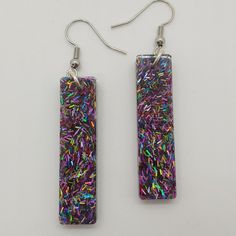 Earrings Rectangle Glitter Multi - Color Glitter Earrings Are Handmade Using Resin With Glitter For Color. Earrings Are Nickel Free. May Have Air Bubbles Or Slight Imperfections. Rectangles Are 1.5" Long 3/4" Wide Purple Glitter Party Jewelry, Multicolor Rectangular Earrings For Party, Purple Rectangular Jewelry For Party, Handmade Rectangular Earrings For Parties, Purple Glitter Earrings For Gift, Rectangular Multicolor Party Jewelry, Using Resin, White Topaz Earrings, Hand Painted Earrings