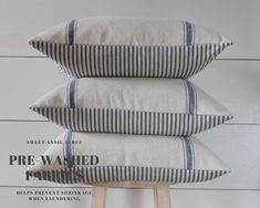 three pillows stacked on top of each other