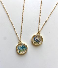 "Show off your school spirit and rep your school with pride with our College Collection necklaces! Ready to take your college gameday fits to the next level and stand out from the crowd? These unique and eye-catching necklaces are different from anything else you'll find in the college merch market. They are perfect for celebrating a college acceptance/commitment or graduation, as well as for all college students, sports fans, alumni, and much more! I can also make this necklace with the logos o College Gifts For Friends, Graduation Basket Ideas, Gifts For Graduating Seniors, Gameday Fits, College Merch, College Grad Gifts, College Jewelry, College Acceptance, College Gameday