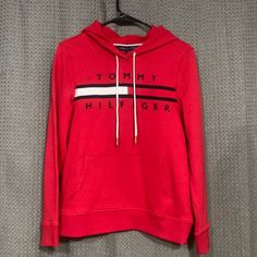 New Tommy Hilfiger Hooded Sweatshirt, Never Worn. Size M Red Hooded Top With Drawstring, Tommy Hilfiger Hooded Tops For Winter, Tommy Hilfiger Hooded Winter Tops, Tommy Hilfiger Sporty Hooded Sweatshirt, Winter Hooded Tops By Tommy Hilfiger, Sporty Hooded Tommy Hilfiger Sweatshirt, Winter Hooded Tommy Hilfiger Tops, Red Hoodie For Spring, Trendy Red Top With Drawstring Hood