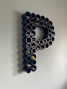 the letter p is made out of cups