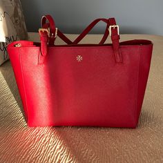 Absolutely Perfect Condition! This Bag Is Stunning!! Tory Burch York Saffiano Leather Tote Bag. Rich Red Leather, Color: Kir Royale No Signs Of Wear Whatsoever!! Gorgeous!! 3 Spacious Compartments, 2 Open, 1 Zippered In The Center. 5 Interior Pockets; 4 Drop-In, 1 Zippered. Gold Hardware. Spotless! 11.5” X 9” X 5” Used One Time - Too Big For Me Smoke Free & Pet Free Home. Red Saffiano Leather Shopping Bag, Red Saffiano Leather Bag For Everyday Use, Designer Red Saffiano Leather Bag, Red Saffiano Leather Bag With Gold-tone Hardware, Red Saffiano Leather Bag For Daily Use, Classic Red Saffiano Leather Bag, Elegant Red Saffiano Leather Shoulder Bag, Kir Royale, Tory Burch Tote