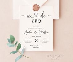 an image of a wedding card with clothes hanging on the line and eucalyptus leaves around it