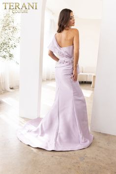 Fall in love with the Terani Couture 241E2468 Trumpet Asymmetrical dress. Embrace its captivating design, graceful silhouette, and ethereal charm. Be the epitome of grace and sophistication at any glamorous soirée or as you walk down the aisle. Let your inner romantic shine in this enchanting masterpiece. One Shoulder Pre-draped Wedding Dress, Pre-draped Asymmetrical Dress With Fitted Bodice, Pre-draped Bridesmaid Dress With Asymmetrical Neckline, Elegant Dresses With Detachable Train For Gala, One Shoulder Evening Dress For Wedding Gala, Gala Gown With Sweep Train And One Shoulder, Elegant Dress With Detachable Train And Fitted Bodice, Pre-draped One Shoulder Evening Dress With Sweep Train, One-shoulder Gown With Sweep Train For Gala