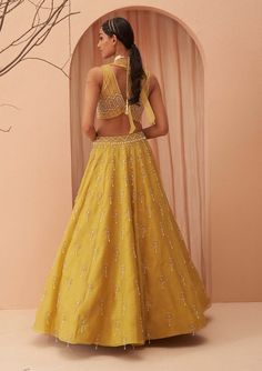 Editors Note Elevate your elegance with this stunning yellow lehenga set adorned with cascading pearls and glistening glass beads. The intricate detailing and exquisite craftsmanship make it a perfect choice for weddings and grand celebrations, ensuring you shine with timeless beauty and grace. Yellow Organza Lehenga, Glass Beads Embroidery, Grey Lehenga, Modern Bridal Gowns, Lehenga Pattern, Yellow Lehenga, Organza Lehenga, Add Sleeves, Beads Embroidery