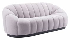 a gray couch sitting on top of a white floor