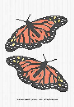 two cross stitch butterflies sitting on top of each other, one orange and the other black