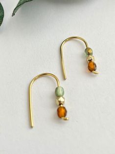 Dainty horseshoe threader earrings with gold and turquoise glass beads. -Approximately 1/2 inch long -Tarnish resistant gold wire -Lightweight -Nickel-free **Customizable! Want different color wire or beads? Leave a note at check out if you want a design other than what is pictured.** Earring Wires Diy, Gold Teardrop Beaded Earrings, Minimalist Nickel-free Gold Beaded Earrings, Minimalist Gold Beaded Earrings With Ear Wire, Everyday Hypoallergenic Gold Beaded Earrings, Minimalist Gold Beaded Earrings As Gift, Earrings Cuffs, Ad Jewellery, Wire Earrings Handmade