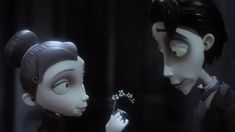 two animated characters are looking at each other's eyes and holding flowers in their hands