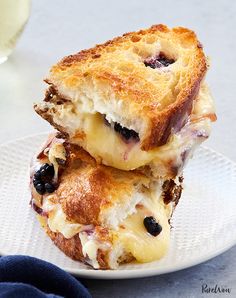 two blueberry cheese sandwiches stacked on top of each other