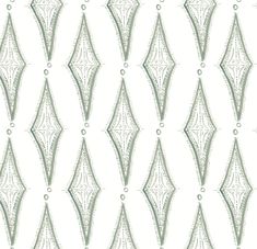 a white and green wallpaper with an intricate design