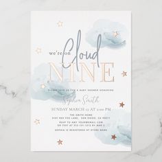 we're on cloud nine baby shower card with gold stars and blue watercolors