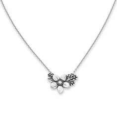 This sweet necklace features a delicate, pretty bouquet of flowers. It pairs well with many of our other floral designs, such as the Blossoms and Bee Ring. Wear it alone or as part of a layering story with other chains. Delicate Flower Pendant Jewelry With Flower Decoration, Elegant Blossom Necklace With Flower Charm, Delicate Blossom Color Necklaces, Feminine Flower Pendant Necklace With Delicate Chain, Delicate Blossom Flower Pendant Necklace, Delicate Blossom Color Flower Pendant Necklace, Feminine Flower Pendant Jewelry With Delicate Chain, Feminine Silver Flower Necklace, Blossom Flower Necklaces For Wedding