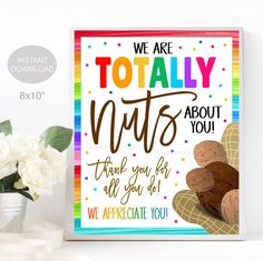 a greeting card with the words, we are totally nuts about you and some flowers